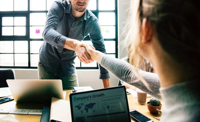 Shaking hands after successful meeting