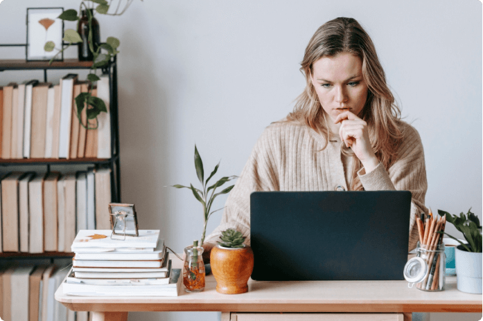 Girl with laptop on desk